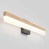 A modern wall-mounted light fixture with a rectangular wooden frame, a diffused white light panel, and a black rectangular base against a plain light gray wall.