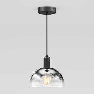 The Artika Nella Pendant without Bulbs showcases a modern clear glass dome shade, exposed bulb design, black cord and ceiling mount, displayed against a plain light gray background.