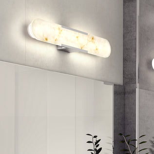 The Selena LED bathroom vanity light by Artika in frosted gold adds modern flair and brightens your minimalist bath above the mirror.