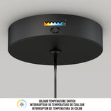 A close-up view of a black ceiling-mounted fixture with a color temperature switch and a labeled indicator showing various color temperatures. A cord hangs from the fixture. Text below describes the color temperature switch in English and French.