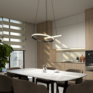Modern dining with a white table, brown chairs, and Artika Mora 28″ LED Pendant (5CCT) above the sleek kitchen.