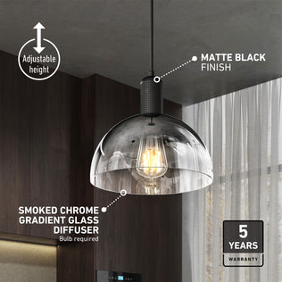 The Artika Nella Pendant without Bulbs features a smoked chrome gradient glass diffuser, matte black finish, adjustable height, and 5-year warranty. The visible bulb design makes it a stylish choice for any kitchen.