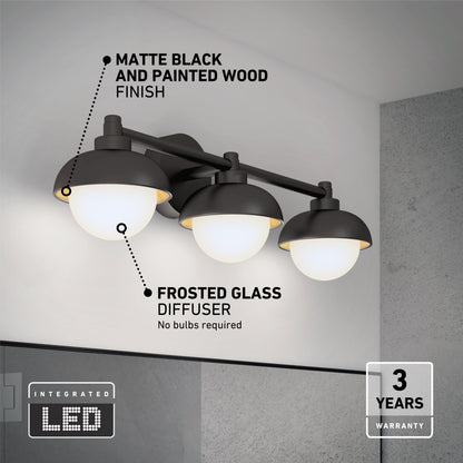 The Artika Boden LED mid-century bathroom vanity light features a matte black and painted wood finish with three frosted glass globes, integrated LED (no bulbs needed), 5 CCT, and comes with a 3-year warranty.