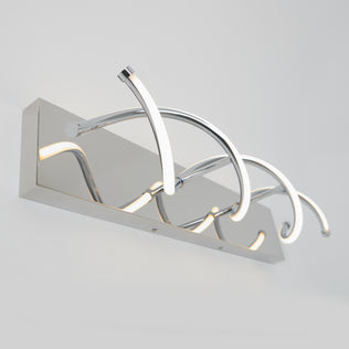 The Artika DNA modern LED bathroom vanity light features three curved arms on a chrome base with integrated LEDs.