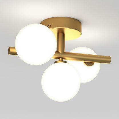 The Artika Bloom modern mid-century LED flush mount light features a gold base and three frosted glass globes in a geometric design, bringing style to any ceiling. Enjoy customizable lighting with 5 CCT options.