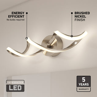 The Artika Swirl LED bathroom vanity light features a modern, wave-shaped brushed nickel design with integrated LED, energy efficiency, and a 5-year warranty.