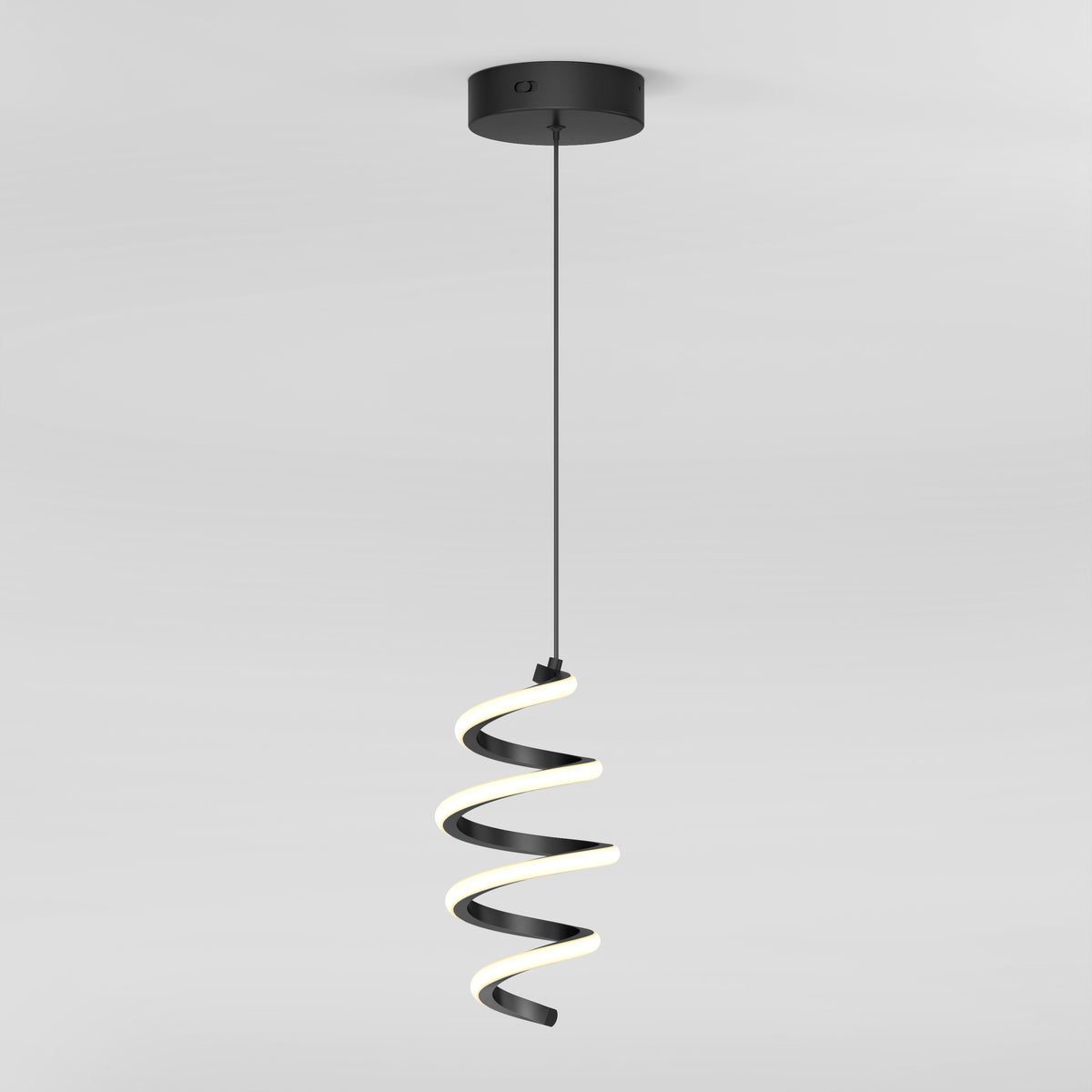 A modern pendant light with a black circular ceiling mount and a hanging spiral-shaped LED fixture, emitting a soft white glow against a plain white background.