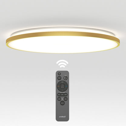 The Artika Europa 21 in. LED modern flush mount light features gold trim and soft white illumination, shown above its black remote control with buttons for brightness and color temperature adjustments.