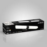 A rectangular black box displays an Artika Wilton LED wall light with an image of the modern, tube-shaped white and black fixture on the front, alongside product features and specifications.