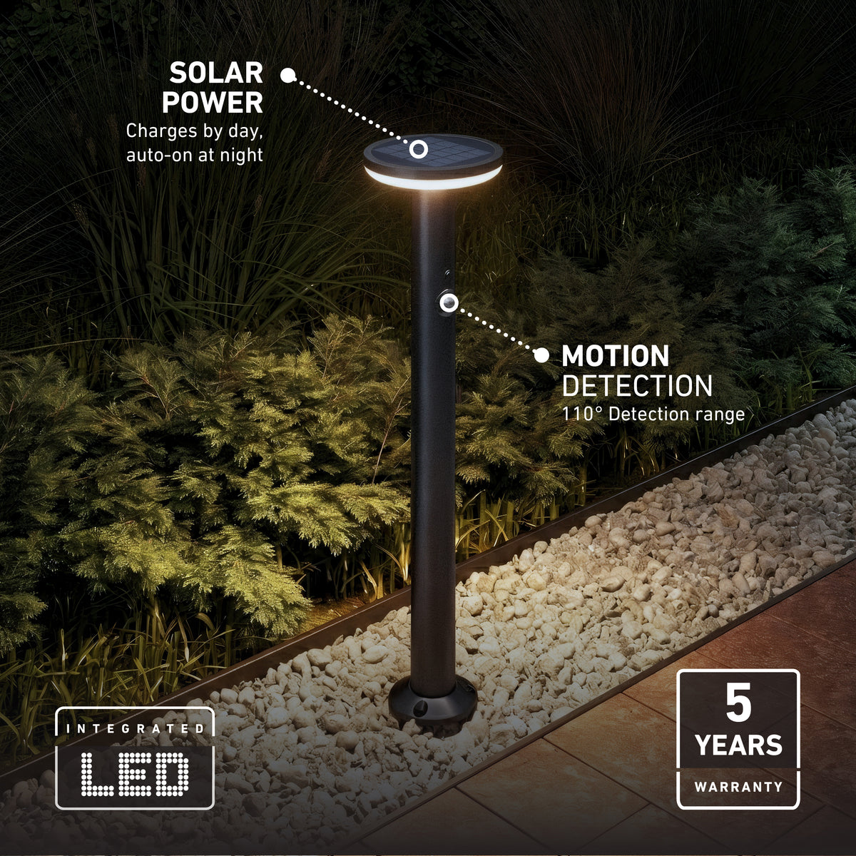 Artika’s Urbia Solar LED Bollard with Motion Sensor glows at night among green plants.