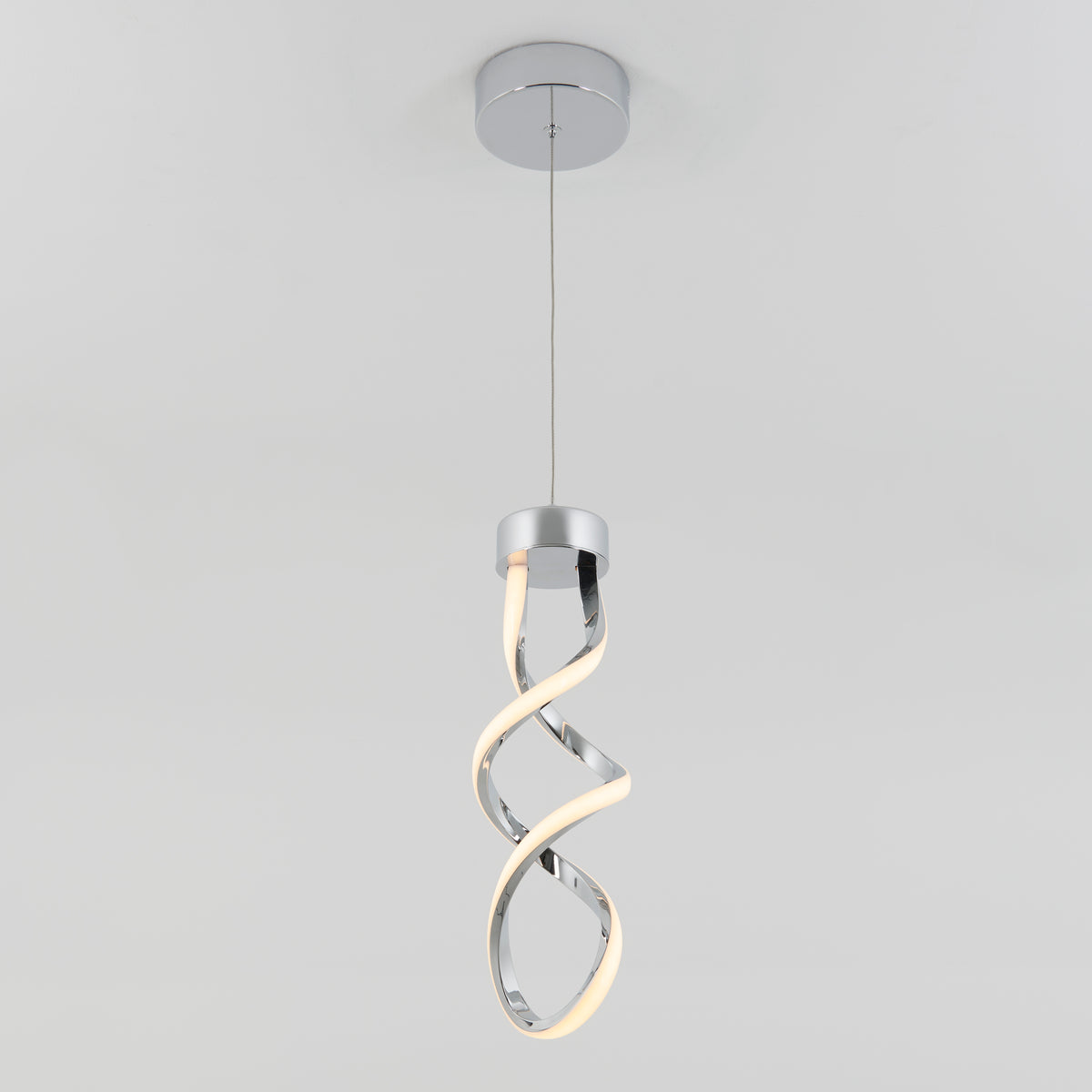 The Artika Mini Swirl LED pendant light features a chrome finish and a double helix design, suspended from a slim wire against a plain white ceiling.
