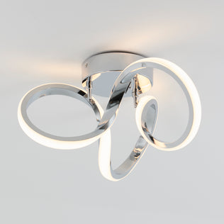 The Artika Swirl LED flush mount features three chrome loops and 1300 lumens, ideal for modern interiors.