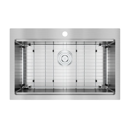 Top-down view of the Artika Newport single bowl stainless steel workstation sink with a protective grid and a central drain hole.