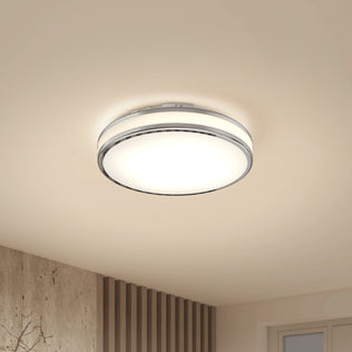 Artika Hemisphere 15 in. LED Flush Mount Ceiling Light, 5 CCT, brightens a modern room with window and beige ceiling.