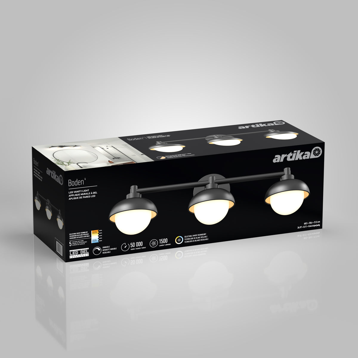 A rectangular box of Artika brand Boden LED vanity light with three round black and white lights is displayed against a light gray background. The packaging shows product features and images of the light fixture.