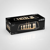 A black rectangular box labeled Artika displays an image of a modern chandelier with eight exposed light bulbs in a horizontal frame. The box is lying on a light gray surface.
