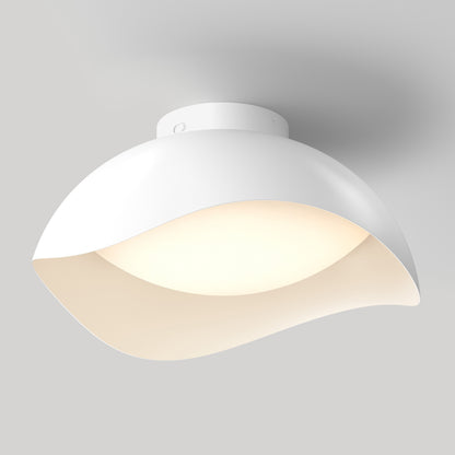 Artika Adara 15 in. (38 cm) Modern LED Flush Mount Ceiling Light 5 CCT, a white, wave-shaped fixture with a glowing circular center.