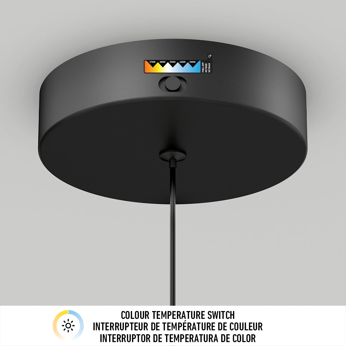 A black ceiling light fixture with a color temperature switch displaying five adjustable color temperature options, labeled with a gradient from warm yellow to cool blue, and a button beneath the indicator.