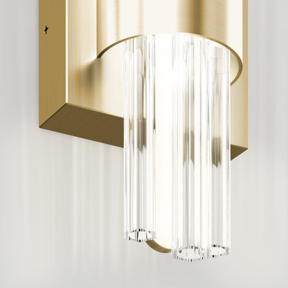Close-up of the Artika Dorado LED Contemporary Wall Sconce, featuring a brushed gold rectangular base and clear glass rods, offering an elegant, modern look with 3 selectable color temperatures.