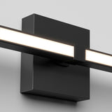 A modern black wall-mounted light fixture with a rectangular base and a horizontal, slim LED bar emitting a soft white glow, attached to a light gray wall.