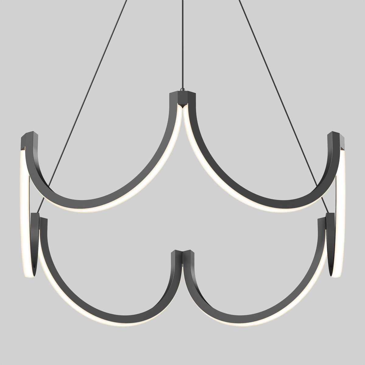 The Artika Adelia LED pendant light 5 CCT is a modern chandelier with two tiers of curved black metal arms and integrated LED lights, suspended by three thin cables against a plain light gray background.
