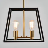 A modern pendant light fixture with two exposed Edison bulbs, gold-colored sockets, and a sleek black geometric frame hanging against a plain light gray background.