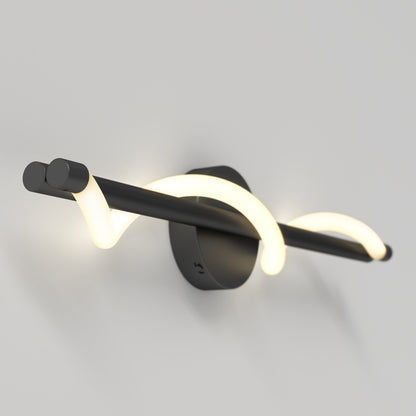 The Artika Neon modern LED bathroom vanity light 5 CCT features a black circular base and horizontal bar with a glowing curved white tube, stylishly mounted on a plain light-colored wall.
