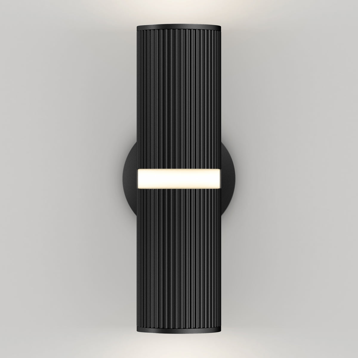 A modern black wall sconce with vertical grooves, mounted on a round base, emits light from a central horizontal strip and from the top and bottom edges, creating a sleek and minimalist lighting effect.