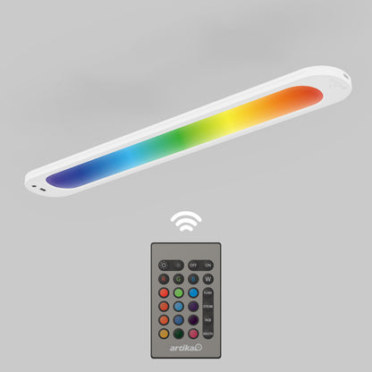 Artika Impulse Under-Cabinet LED Light RGB+CCT shown above a remote with multi-colored buttons.