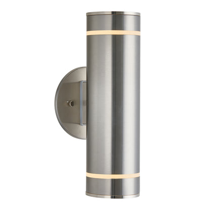 The Artika C7 indoor-outdoor wall light features a modern brushed metal cylinder design with a round backplate and dual thin light bands at the top and bottom, perfect for both indoor and outdoor spaces.