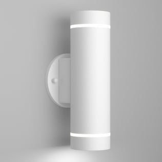 The Artika C7 indoor-outdoor LED wall light 3 CCT is a modern, cylindrical white sconce featuring soft white LED rings at the top and bottom, shown mounted on a plain light gray wall.