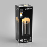 A black box featuring an Artika Hanson pendant light with a wood accent is shown. The front displays the product image, energy ratings, features, warranty details, and icons for light quality and energy efficiency.