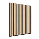 A decorative wall panel featuring vertical light wood slats evenly spaced over a black background, shown from an angled side view.