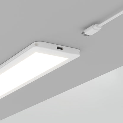 Artika Maestro under cabinet LED light 3 CCT (3-pack), white cable, visible charging port—perfect for kitchen use on gray ceilings.