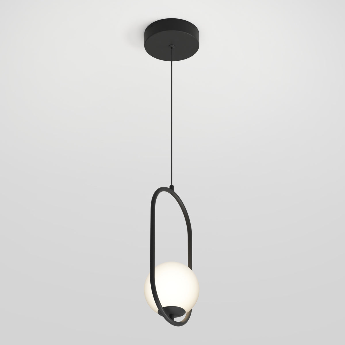 A modern pendant light with a black circular ceiling mount, black cord, and an oval-shaped black frame holding a frosted white globe-shaped bulb, hanging against a plain white background.