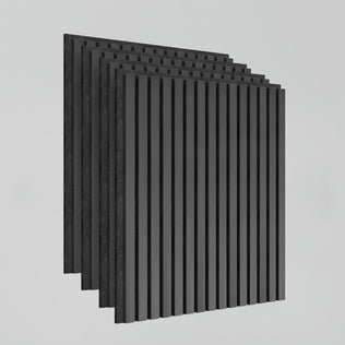 Four Artika Sonolok 15.5 ft sound-absorbing wall panels, featuring evenly spaced vertical grooves, are stacked together against a plain light gray background.
