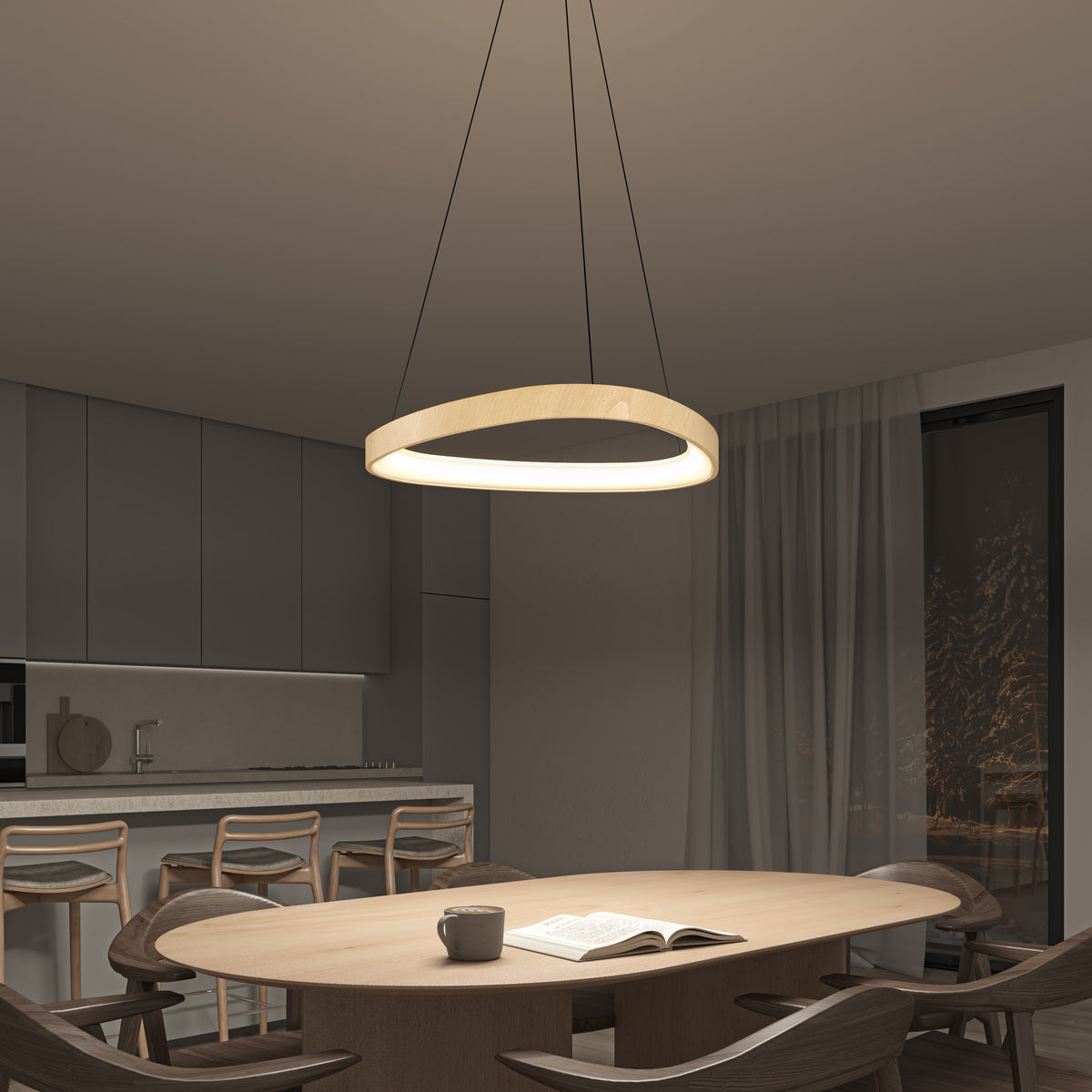 Modern dining room with a round wooden table, six chairs, a cup, and an open book. An illuminated circular pendant light hangs above. The background shows a minimalist kitchen and large window with sheer curtains at night.