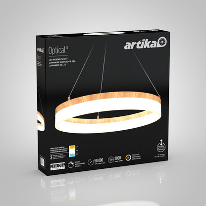 Box of Artika Optical LED pendant light 3 CCT, pictured as a round wood-finish fixture hanging by wires. Packaging showcases minimalist lighting, 50,000-hour life, and brightness of 2000 lumens.