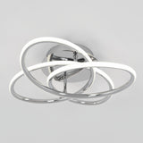 A modern ceiling light fixture with three interlocking chrome rings, each featuring integrated LED lighting, mounted on a reflective circular base against a plain white background.