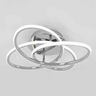 The Artika Swirl Butterfly LED contemporary flush mount light features interlocking chrome rings with integrated LEDs, creating a striking modern fixture on a round chrome base against a plain white background.