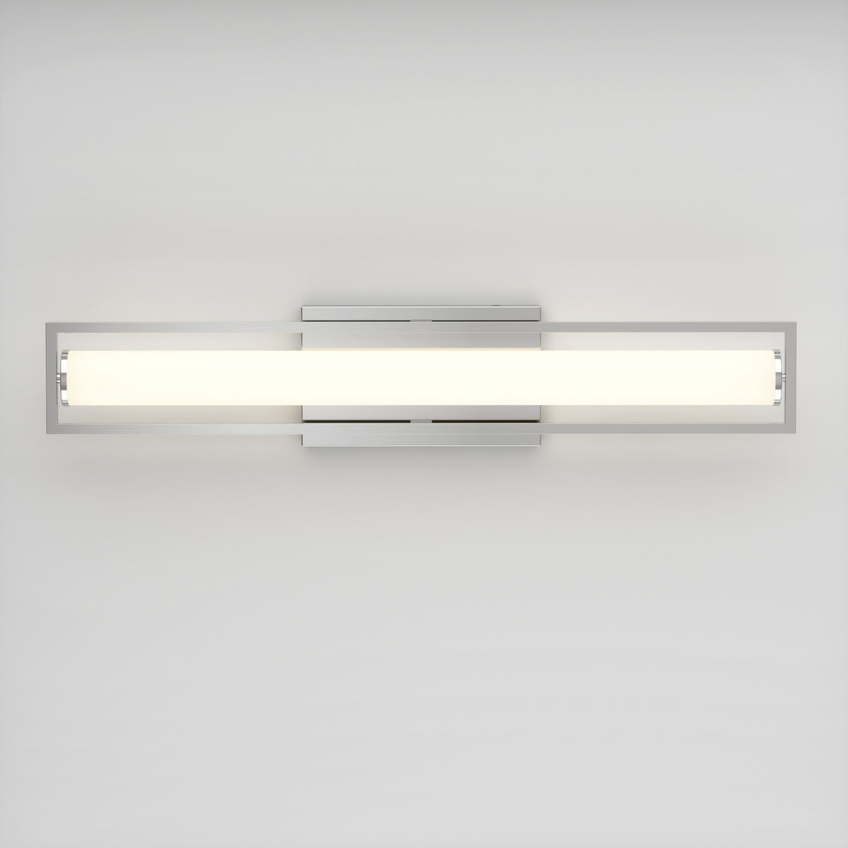 A modern, rectangular wall-mounted light fixture with a long, white frosted glass shade and a sleek silver metal frame, set against a plain white wall.