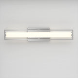 A modern, rectangular wall-mounted light fixture with a long, white frosted glass shade and a sleek silver metal frame, set against a plain white wall.