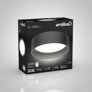 An Artika Alton LED flush mount ceiling light in black and gray sits in its packaging, which displays a large image of the round fixture, key product details, feature icons, and the Artika brand logo on a gray background.