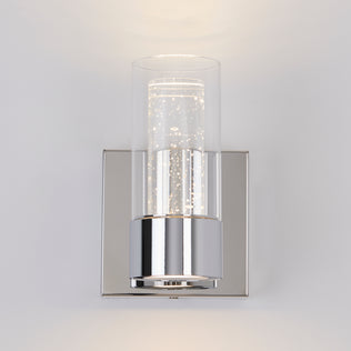 The Artika Essence 1-light LED vanity light features a cylindrical glass shade and chrome base for elegant accent lighting.