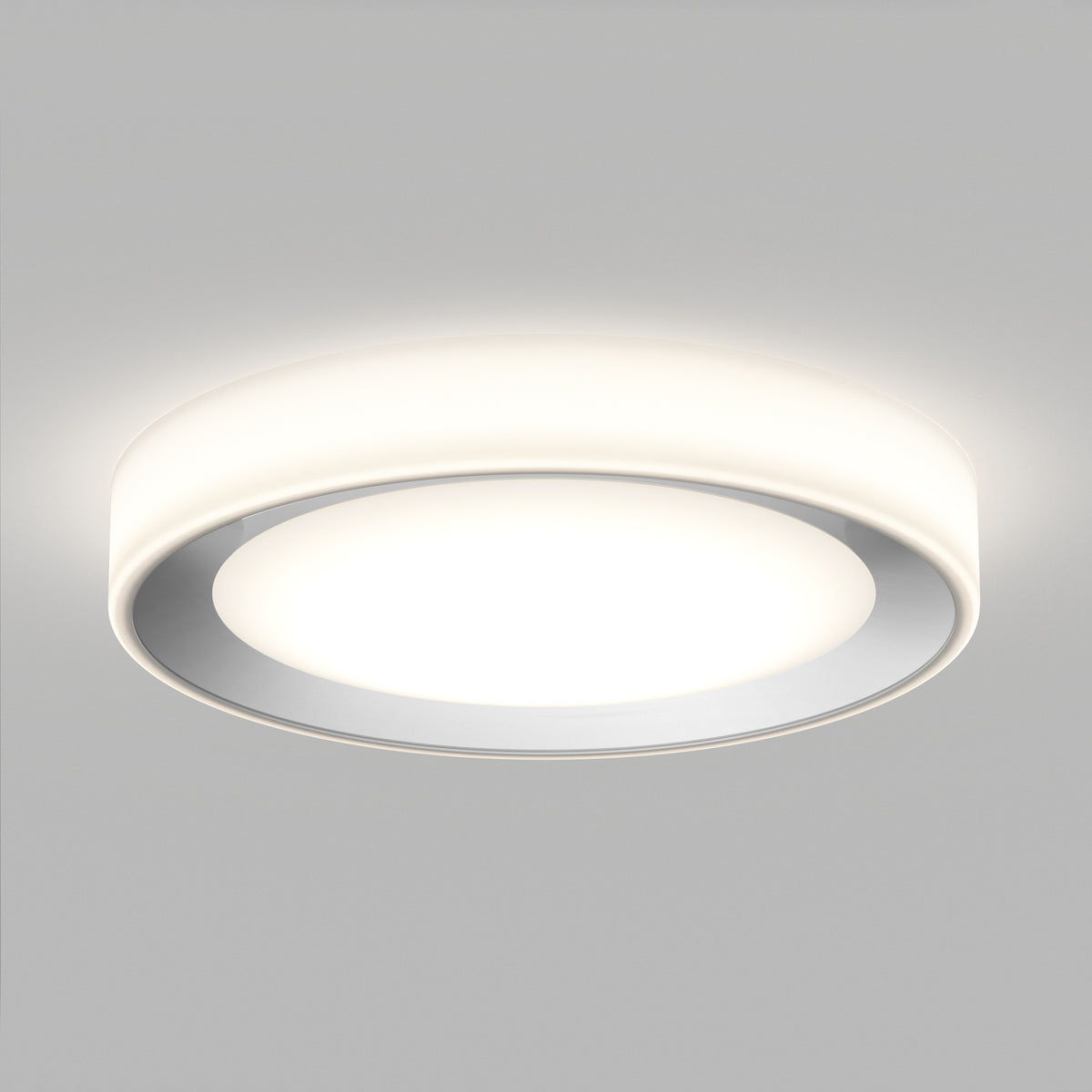 The Artika Cooper LED flush mount light features a glowing white center, smooth round design, and includes a remote.
