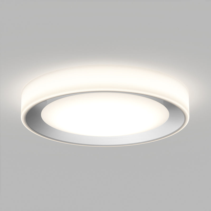 The Artika Cooper LED flush mount light features a glowing white center, smooth round design, and includes a remote.