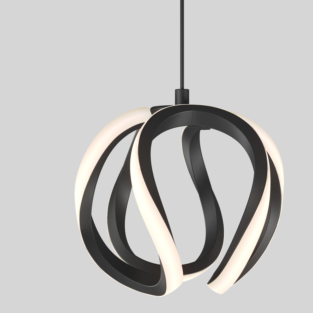 A modern pendant light with a twisted, ribbon-like design in black and white, suspended from a black cord against a plain light gray background.