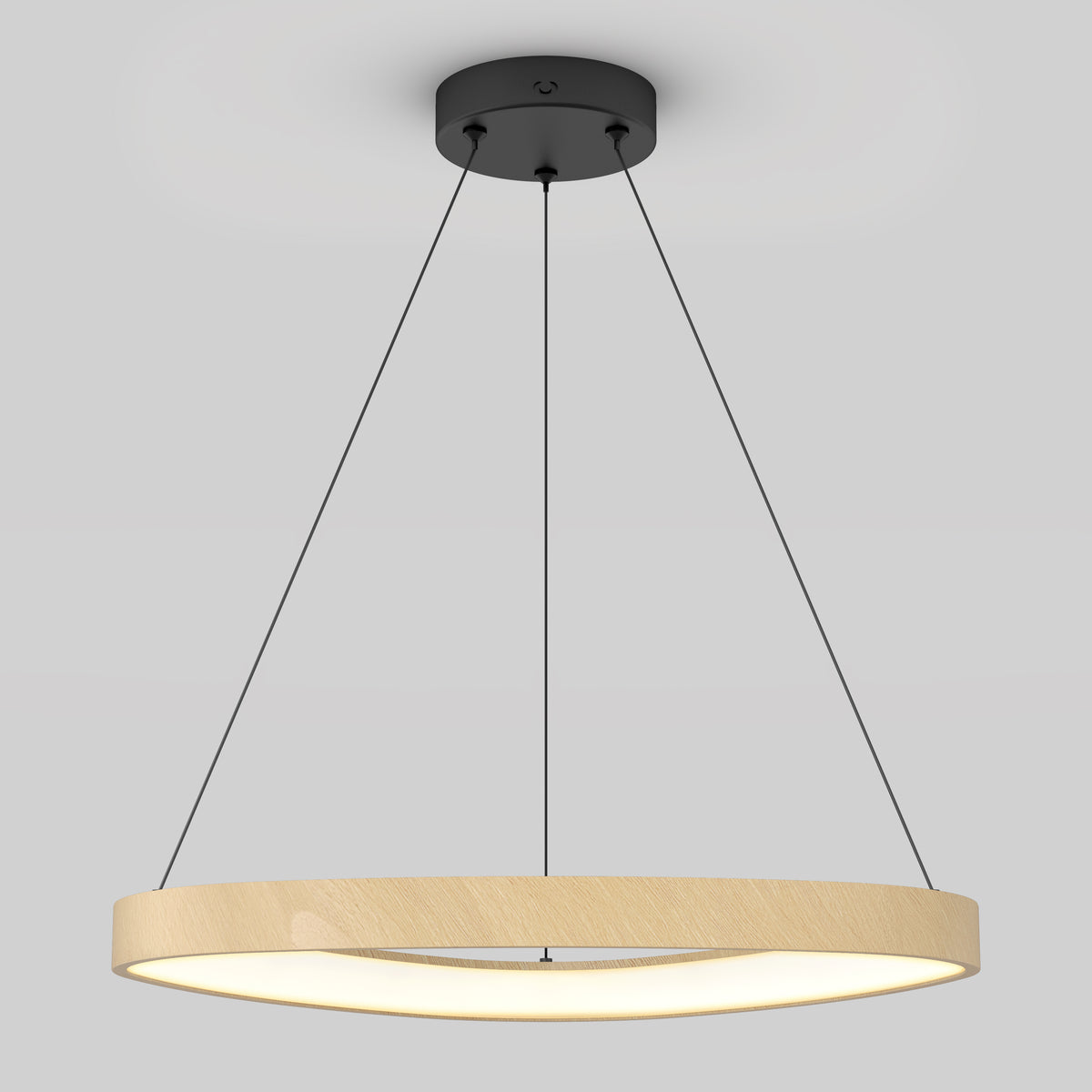 A modern circular pendant light with a wooden frame, suspended by three thin black cables from a black ceiling mount, glowing with soft white light against a plain gray background.