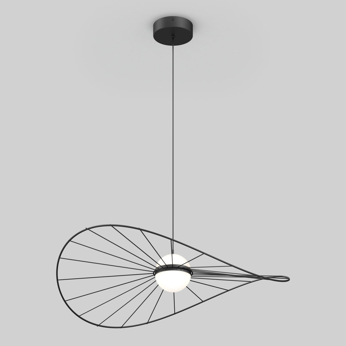 A modern pendant light with a black cord, circular ceiling mount, round white bulb, and a sculptural wire frame resembling a stylized leaf or wing, suspended against a light gray background.