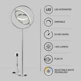 Modern floor lamp with circular LED design, shown plugged in. Infographic highlights its features: LED integrated, dimmable, 50,000-hour lifespan, 1300 lumens, plug-in, and selectable white technology.
